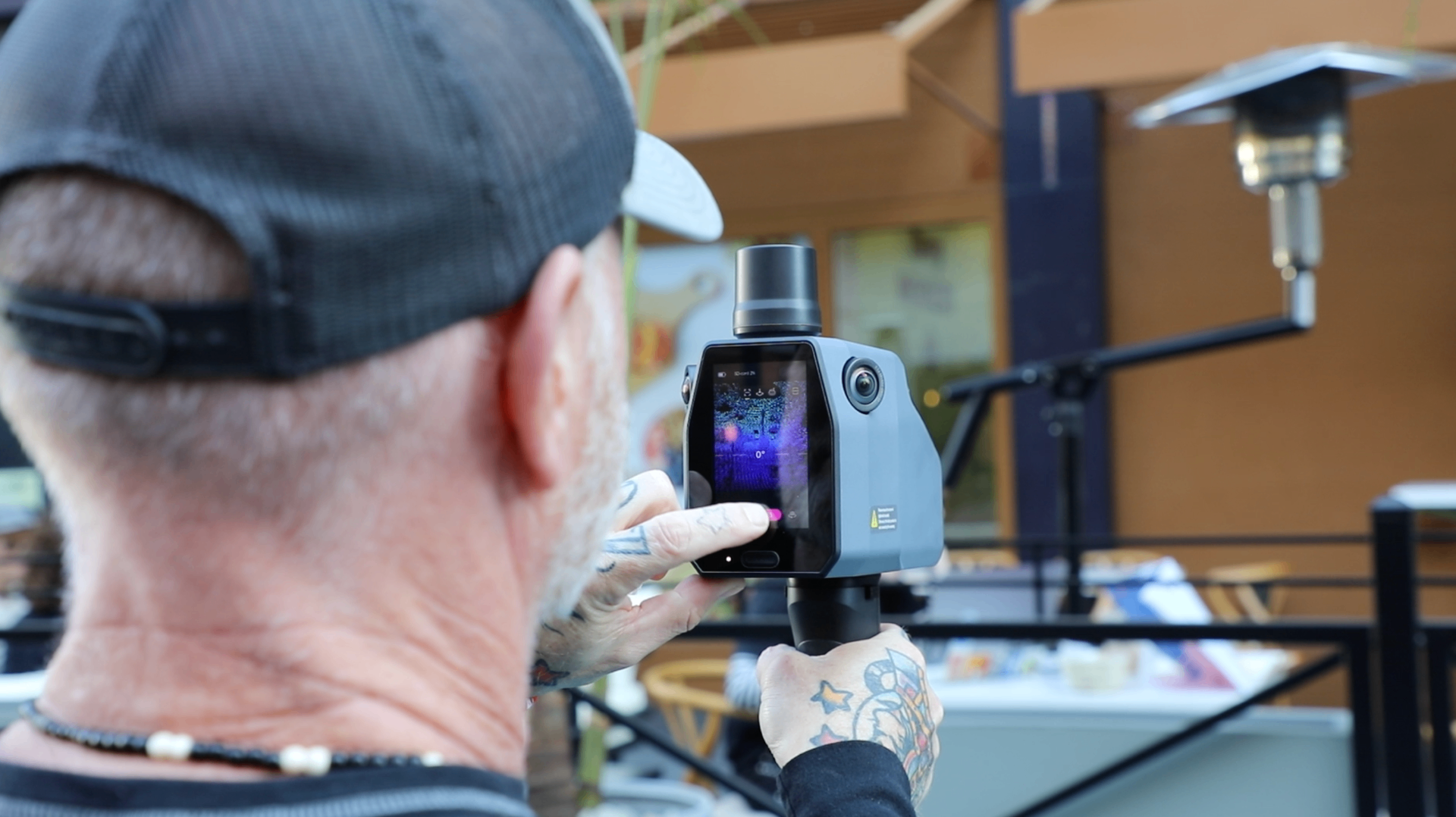 Robotic Data operator scanning San Jose with a handheld LiDAR device